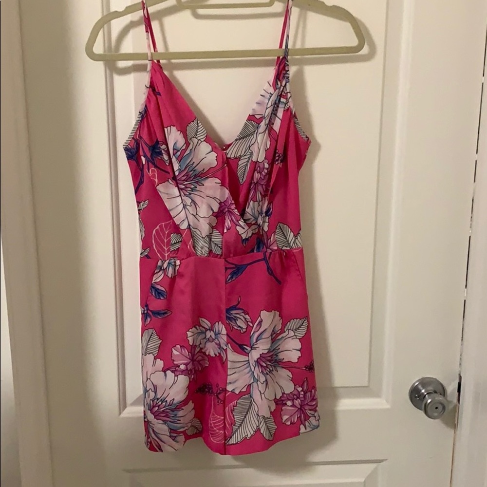 Pink floral romper size xs